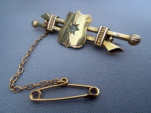 Antique Australian Gold brooch with shield design and chain.  Aronson & Co Melbourne