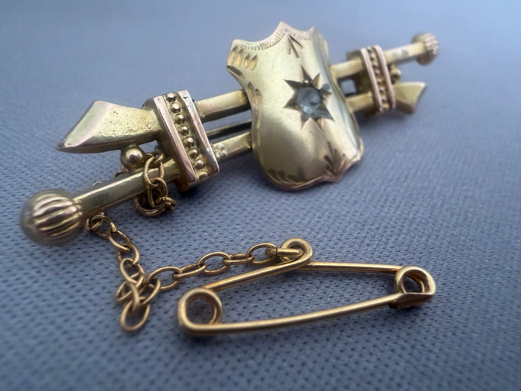 Antique Australian Gold brooch with shield design and chain .  Aronson &  Co Melbourne