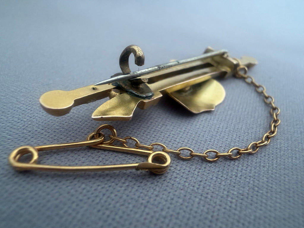 Antique Australian Gold brooch with shield design and chain.  Rear shows safety chain and latch  Aronson &  Co Melbourne