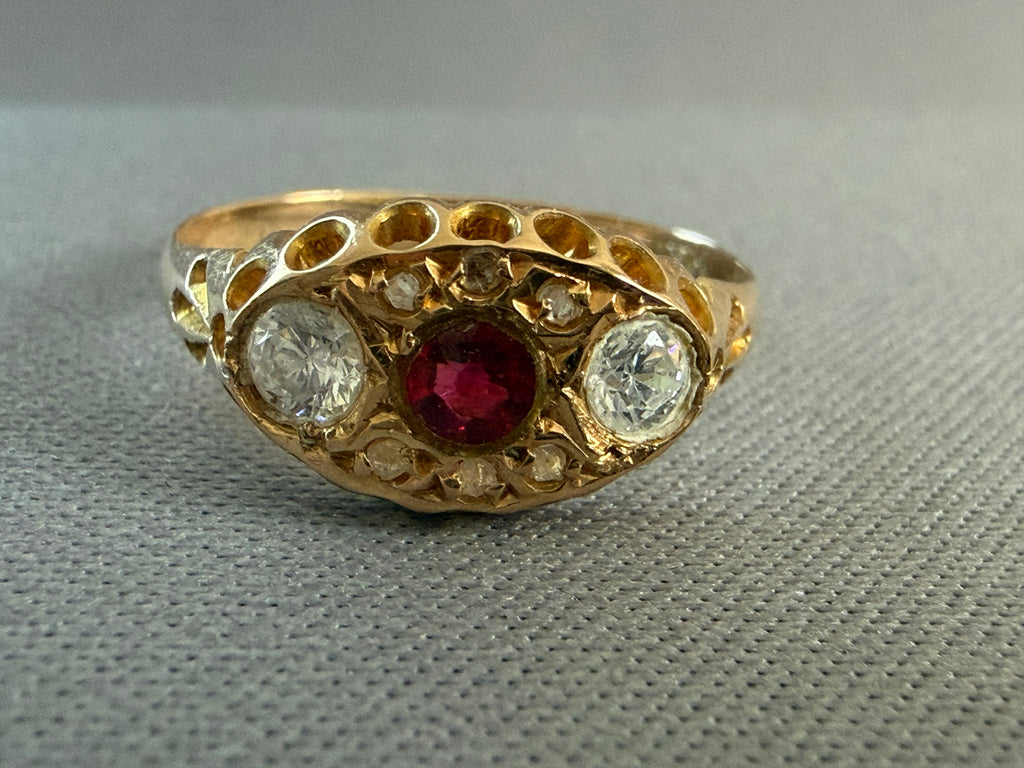 Antique Victorian 18ct gold paste ring, front — ruby-coloured centre with white paste accents, Birmingham 1905
background