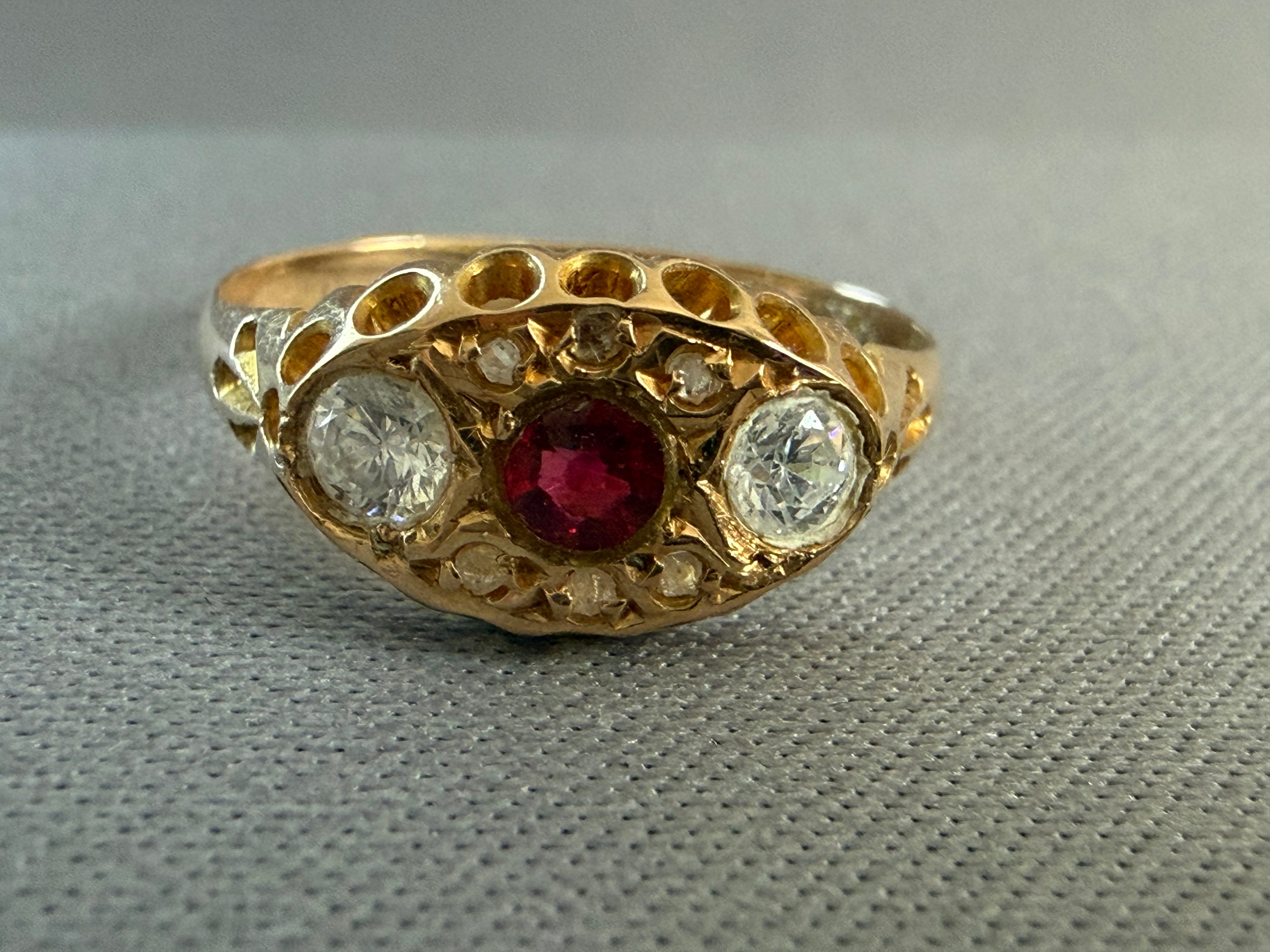 Antique Victorian 18ct gold paste ring, front — ruby-coloured centre with white paste accents, Birmingham 1905
background