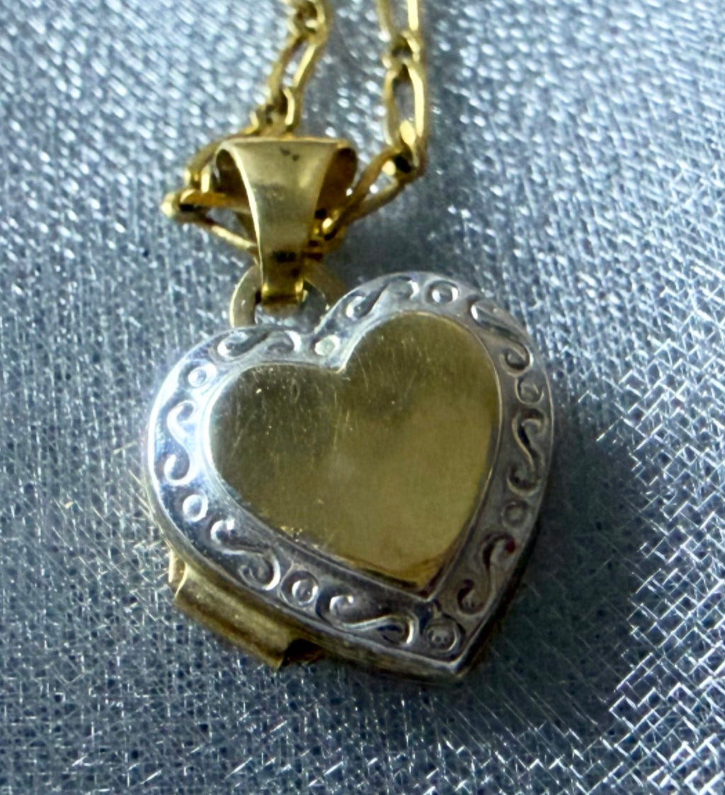 Vintage 9ct gold heart locket, front — engraved scrollwork detail, 1950s–1960s